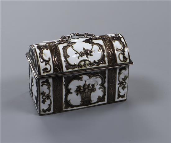 An Edwardian silver and white enamel miniature casket by Harold Child, London, 1904, 80mm.